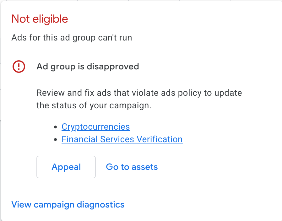 Google Ads screen showing the SwiTra ad group disapproved under cryptocurrency and financial services verification policies